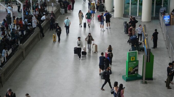 Suasana kedatangan Wisman di Bandara Ngurah Rai Bali - IST