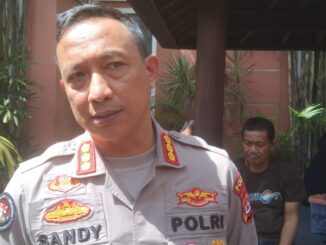 Kabid Humas Polda Bali Kombes Pol Ariasandy saat menjelaskan kematian mahasiswa Unud - IST