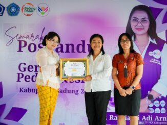 Nyonya Rasniathi Adi Arnawa secara resmi membuka Semarak Posyandu Kabupaten Badung Tahun 2026 di Banjar Kembangsari, Desa Blahkiuh, Kecamatan Abiansemal, Selasa (19/5) - IST --