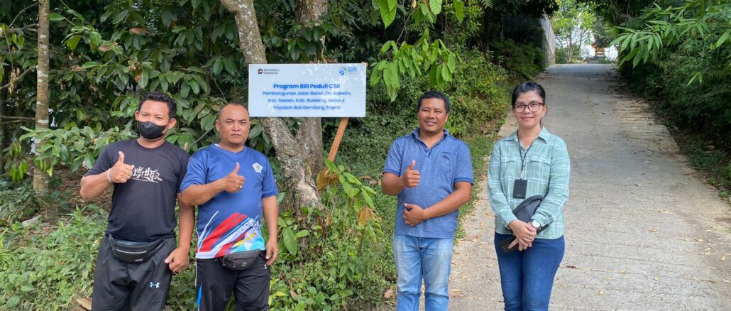 Penyerahan jalan beton di Desa Bebetin, Kecamatan Sawan, Kabupaten Buleleng, melalui program TJSL (Tanggung Jawab Sosial Lingkungan) - IST