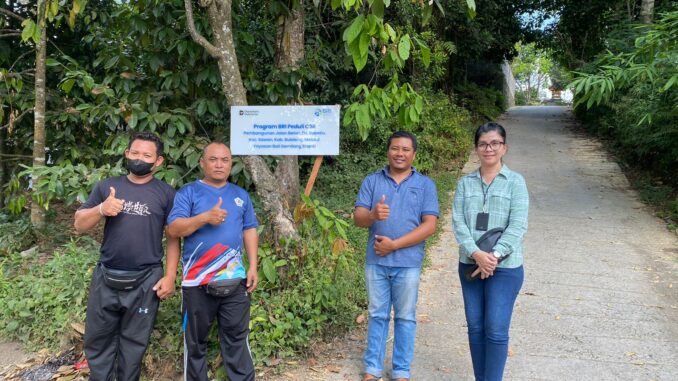 Penyerahan jalan beton di Desa Bebetin, Kecamatan Sawan, Kabupaten Buleleng, melalui program TJSL (Tanggung Jawab Sosial Lingkungan) - IST