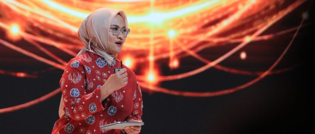 Direktur Utama Telkom Dian Siswarini memberikan opening speach dalam Bali Annual Telkom International Conference di Bali International Convention Center, Nusa Dua, Bali, Rabu (26/8/2026). - IST