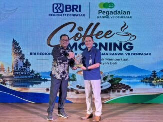 Regional CEO BRI Region 17 Denpasar, Hery Noercahya dan Pemimpin Wilayah PT Pegadaian (Persero) Kanwil VII Denpasar Edy Purwanto - IST
